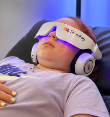 A child getting brain tap therapy