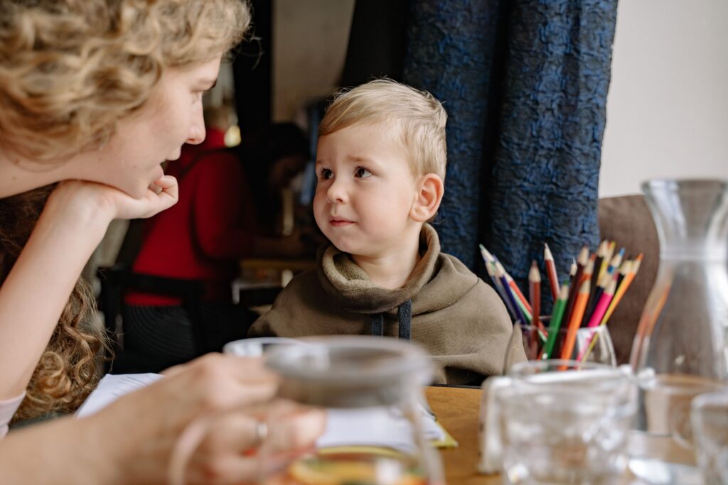mother talking to her child with autism